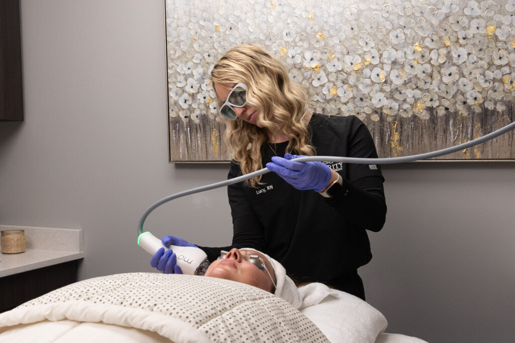 An expert provider performs facial laser skin resurfacing in Kansas City, MO